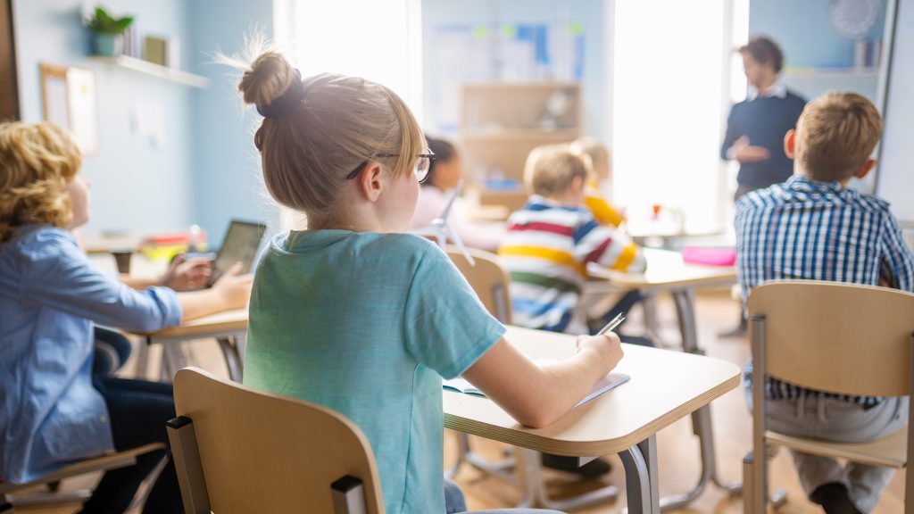 Kids in a classroom in a family-friendly neighborhood in Northern Virginia, perfect for school-aged children.
