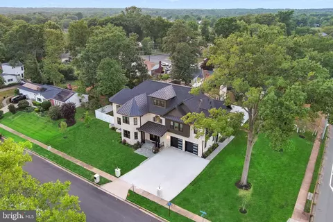 Suburban neighborhood in Centreville, Virginia featuring well-kept homes, and kids playing on a quiet residential street
