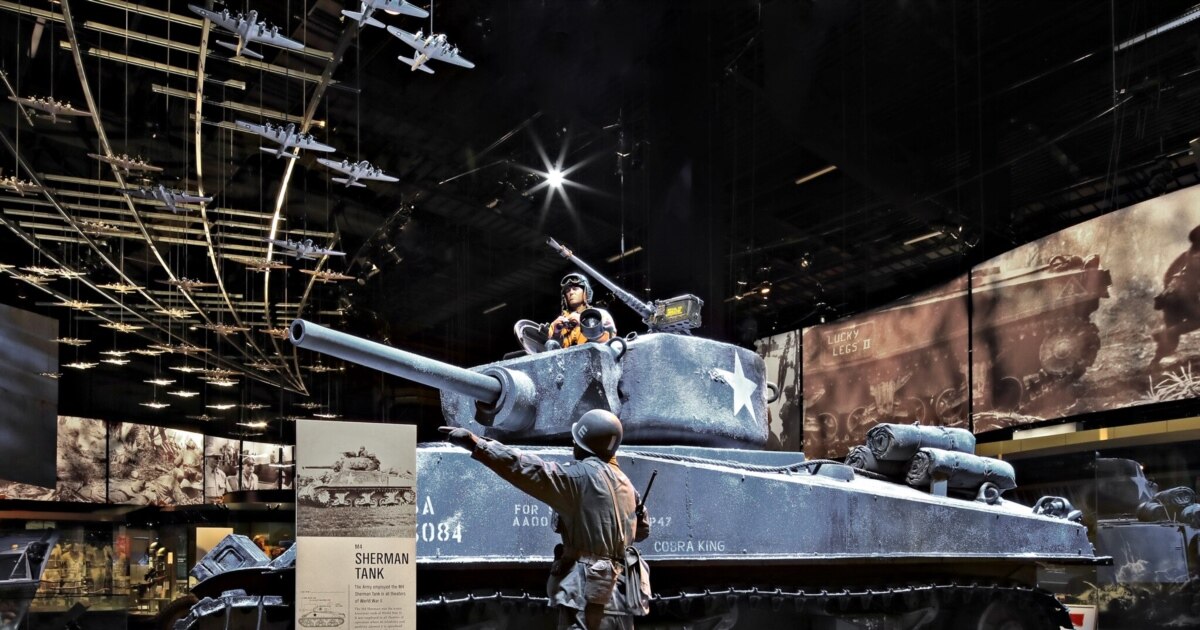 Visitors experiencing interactive exhibit celebrating the Army's 250th anniversary at Fort Belvoir.
