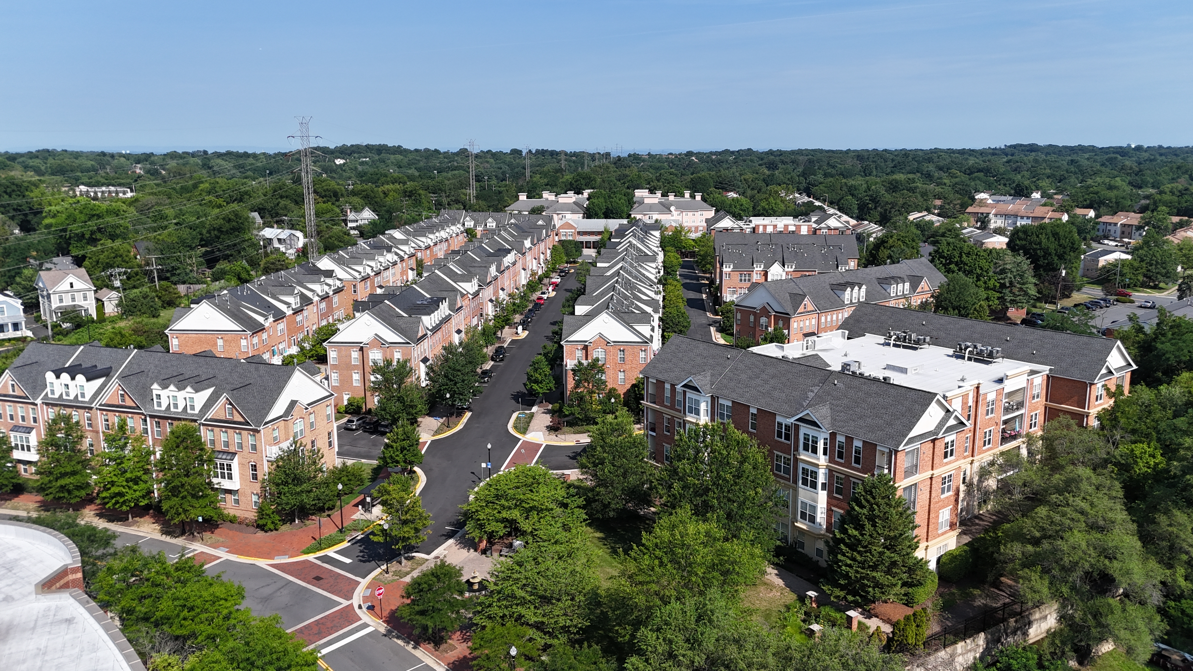  Aerial view of brick townhomes in Herndon, VA