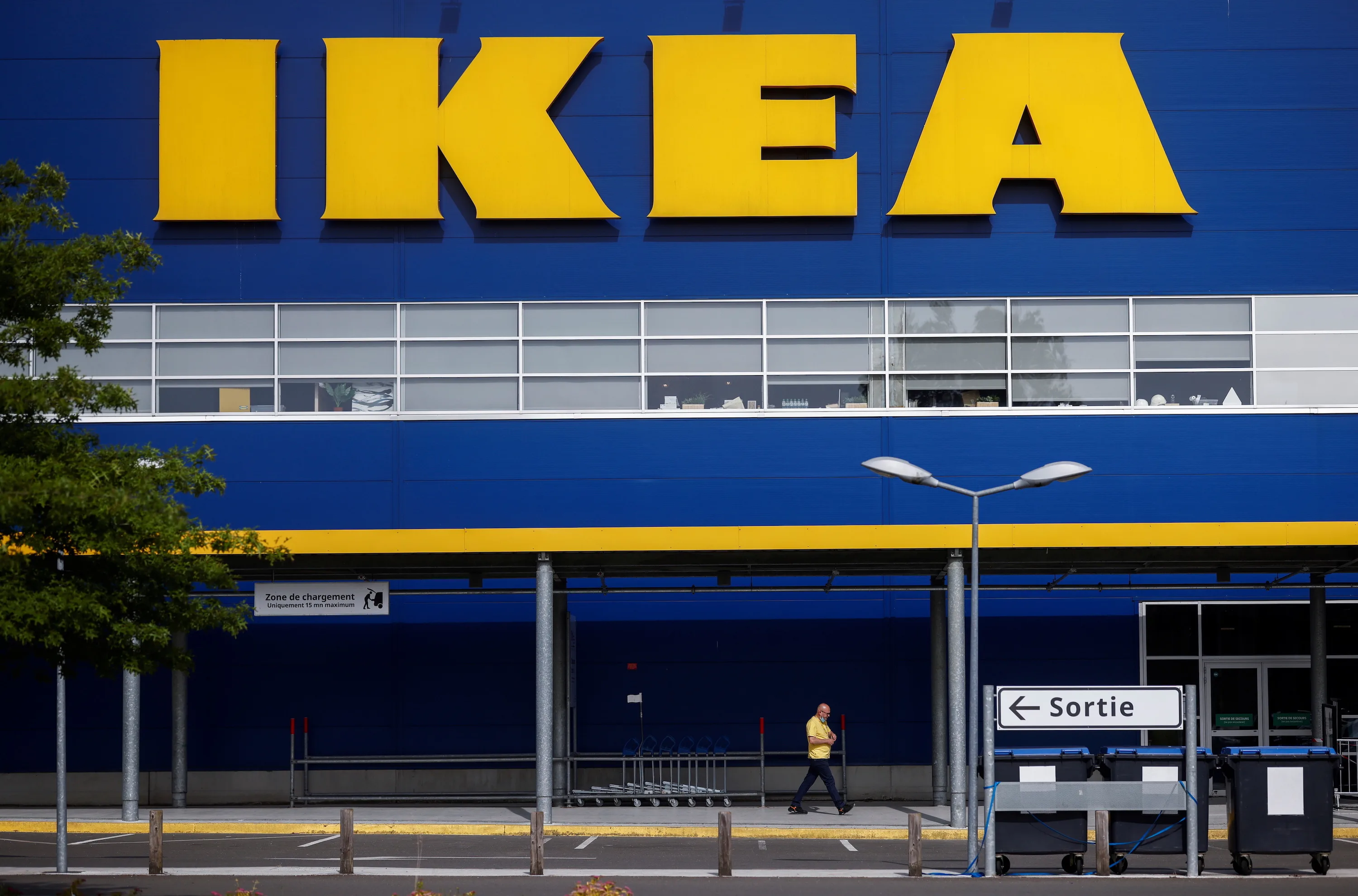 Exterior view of a large blue and yellow IKEA store with the prominent IKEA logo, symbolizing IKEA's presence and potential expansion in the Northern Virginia market, particularly with a new Chantilly restaurant.