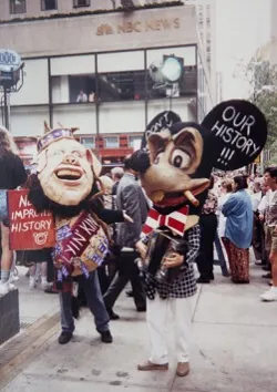 A 1990s photo of protesters with satirical Mickey Mouse costumes rallying against the Disney's America project.